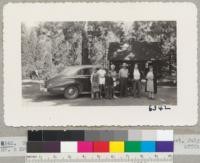 Group in front of Live Oak Lodge, Whitaker's Forest, July 1943. Mr. & Mrs. Alan Milnes, the Metcalfs and Wiley Keys. Metcalf