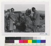 Petaluma area, Mr. & Mrs. Al Schleth, Mr. & Mrs. Nielsen and Ray Isle at the Schleth Monterey pine plantation of Apr. '53