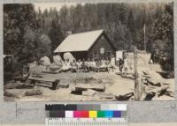 The campfire circle and headquarters building at Whitaker's Forest. July 1930