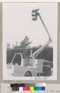 Bosworth and Sohner in the new Skylift for pruning trees (Milford, Connecticut). Note controls at side of cab