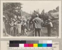 A stop is made at Felton to see the seedlings and transplants of Roberta Dannenburg (right), Agricultural Club member. Later she exhibited trees grown at the County Fair