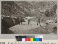 Pratt, Peters, and Tuttle cannot span the gully made beneath 200 acre burn by 3" rain April, 1926. Metcalf. 1926