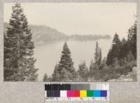 Emerald Bay, Lake Tahoe, from ridge above Cascade Lake. Typical crowns of red fir and lodgepole pine. Note dead fir top in middle foreground, the result of beetle work. July, 1922