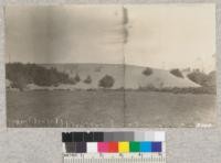 Sand dune north of Fort Bragg encroaching on flat land. June, 1923