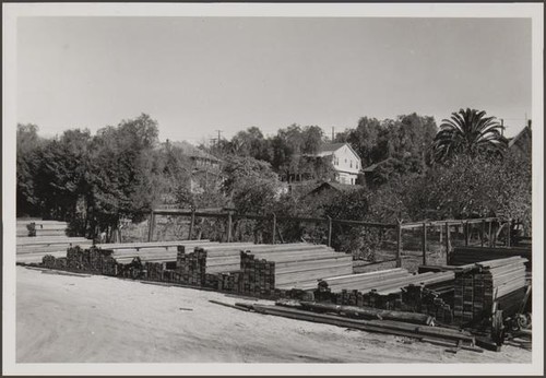 South Broadway lumber yard on east side between Evanston Place and Del Mar Boulevard, east toward orange garden