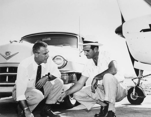 Poddy Mercer talking with Herman "Fish" Salmon at Lockheed Air Terminal