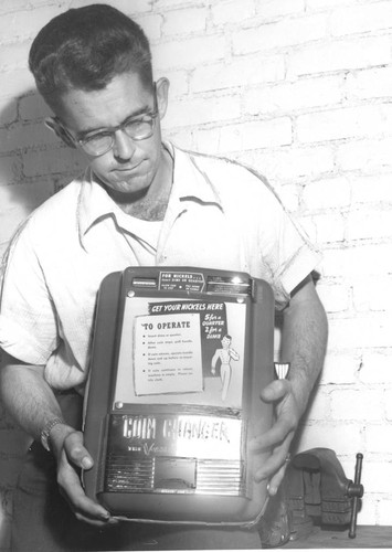 Parking lot coin changers installation, 1953