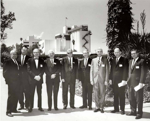 Group portrait outside Schlitz brewery, Van Nuys