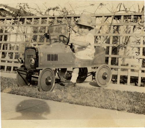 Robert Holtby in a Stutz toy car, 1926