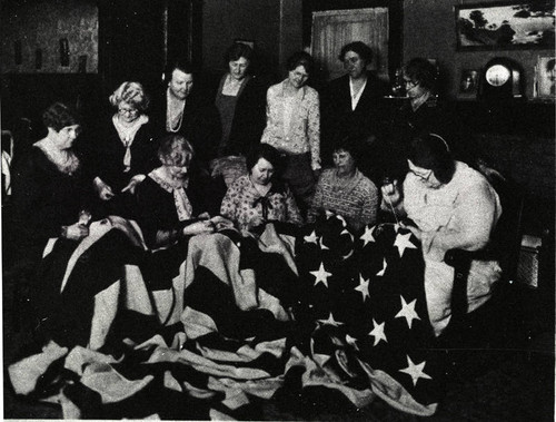 Thimble Club of Glendale Women's Auxiliary repairing flag, 1929