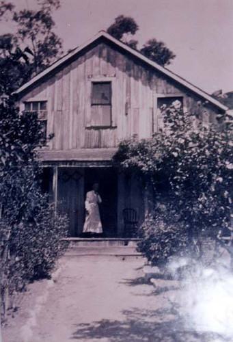 Ann Willden Johnson in front of Johnson residence, Chatsworth, circa 1900