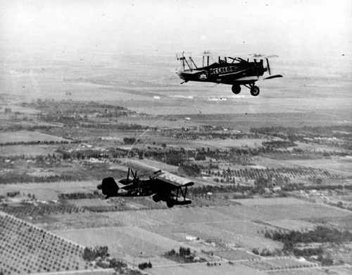 Bi-plane during first In-Flight Women's refueling endurance Record, Nov. 27, 1929