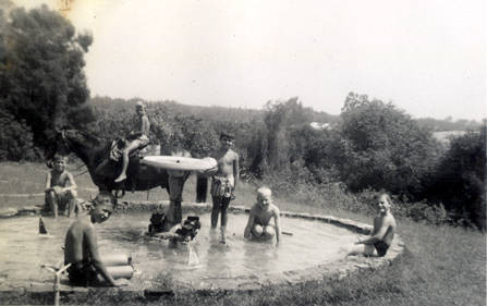 Boys playing in the fountain at the John Show ranch