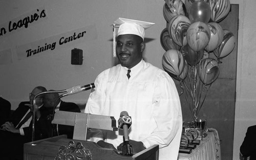 Urban League Training Center graduate speaking during ceremonies, Los Angeles, 1993