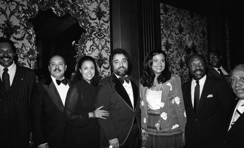 Testimonial to Pioneer Black Historical Achievement dinner attendees posing together, Los Angeles, 1981