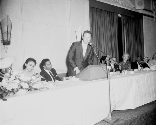 A man at a podium, Los Angeles