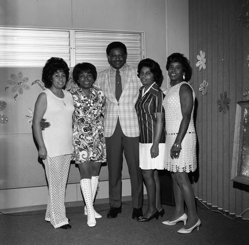 Children's fashion show participants posing together, Los Angeles, 1971