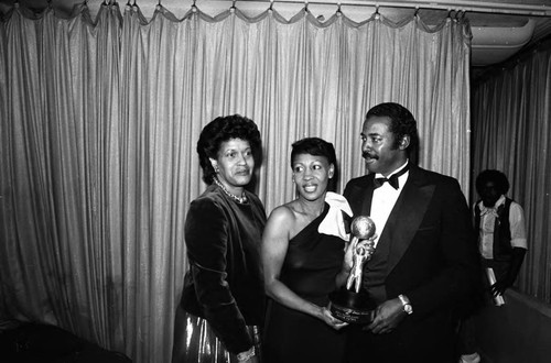 Myrlie Evers and Don Mitchell posing with Maxine Waters during the NAACP Image Awards; Los Angeles, 1981