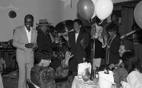 Gertrude Gipson-Penland celebrating with Charles Robinson and Melba Moore, Los Angeles, 1989