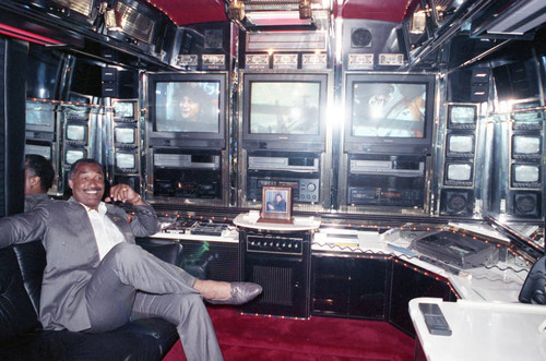 Shelly Garrett sitting inside a mobile production unit, Los Angeles