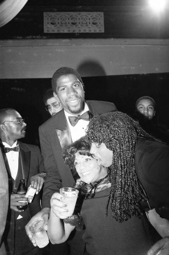 Magic Johnson and Rick James celebrating at the American Music Awards Los Angeles, 1983