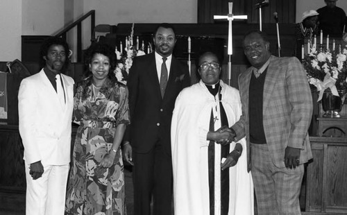 Rev. V. L. Brenson posing with others at the Bryant Temple AME Church, Los Angeles, 1986