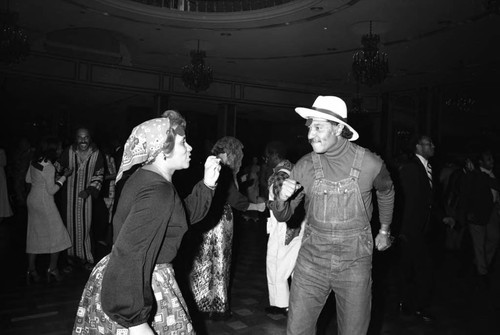 LeRoy Beavers and Jessie Mae Brown Beavers dancing in costume at a fundraiser, Los Angeles, 1974