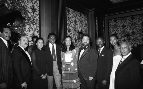 Testimonial to Pioneer Black Historical Achievement dinner attendees posing together, Los Angeles, 1981