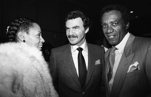 Burt Reynolds with other Black Talkies on Parade event attendees, Los Angeles, 1986