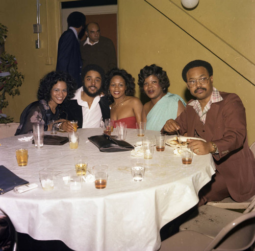 Guests posing together at a Super Bowl party, Los Angeles, 1977