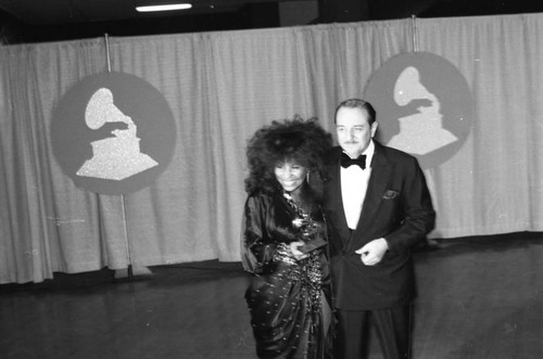 Chaka Khan and Arif Mardin posing with their Grammy at the 26th Annual Grammy Awards, Los Angeles, 1984