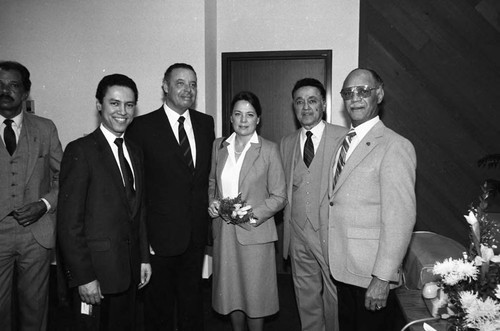 Elbert T. Hudson and Paul C. Hudson posing at a Broadway Federal Savings and Loan event, Los Angeles, 1984