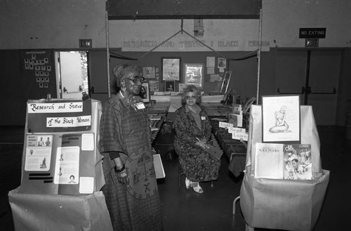 Two women exhibit research at the African Market Place, Los Angeles, 1987