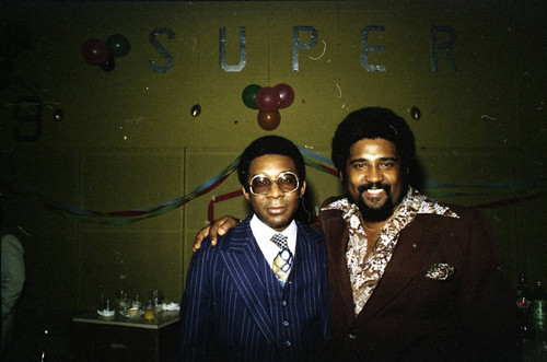 Guests posing together at a Super Bowl party, Los Angeles, 1977