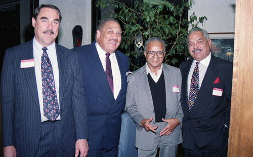 Atkins & Evans guests posing with Irwin S. Evans, Los Angeles, 1994