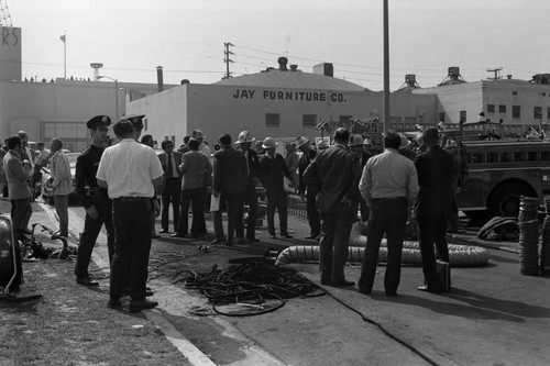 First responders at the scene of a sewer explosion and flash fire, Los Angeles, 1972