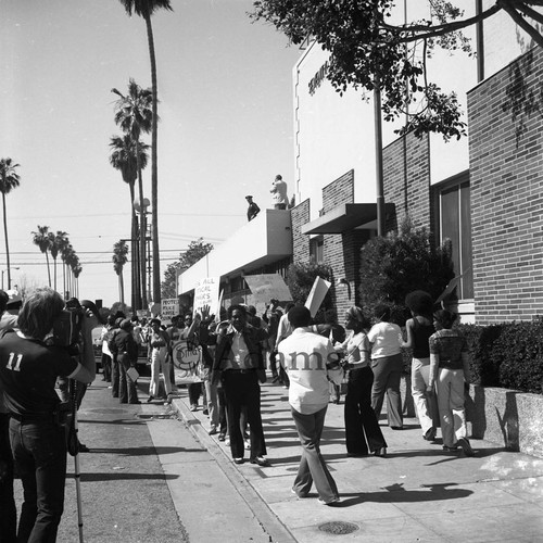 Protesters on sidewalk, Los Angeles, 1977