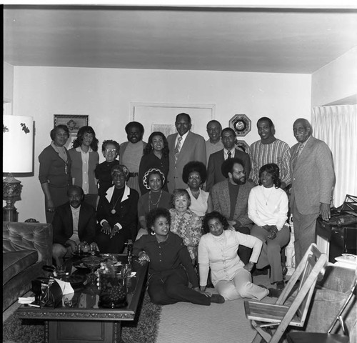 Tom Bradley posing with A. Philip Randolph Institute members, Los Angeles, 1973