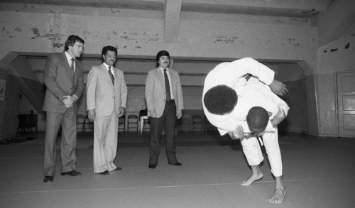 Robert Farrell watching Judo practice, Los Angeles, 1983