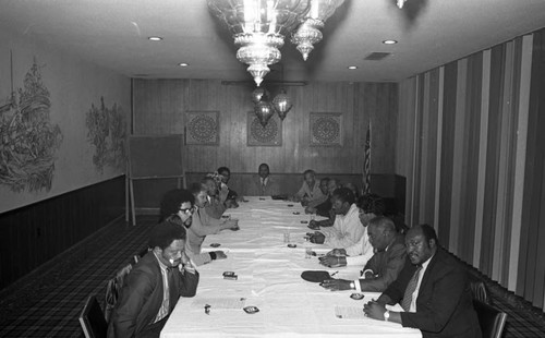 A. Phillip Randolph Institute conference attendees sitting at a table, Los Angeles, 1973