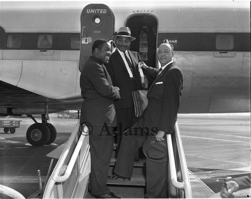 Dr. Martin Luther King Jr. at airport, Los Angeles, 1958