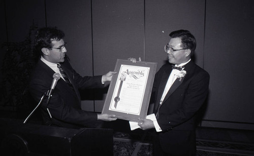 Stewart Kwoh receiving a commendation from the California Assembly, Los Angeles. ca. 1989