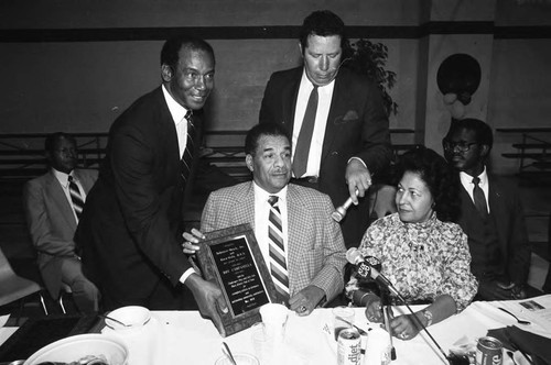 Ernie Banks presenting Roy Campanella with a plaque inducting him into the Black Athletes Hall of Fame, Los Angeles, 1984