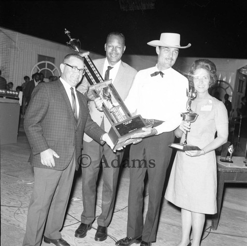 Bradley awarding trophy, Los Angeles, 1967