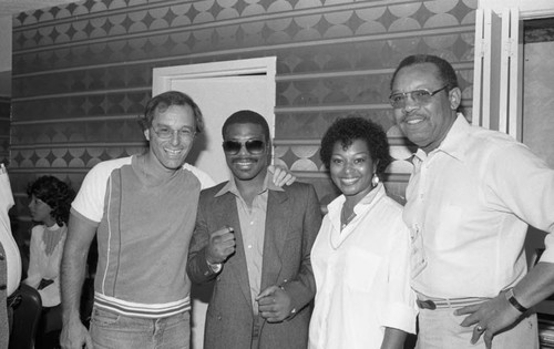 Aaron Pryor posing with Brad Pye and others, Las Vegas, 1983