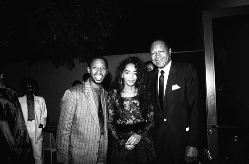 Jeffrey Osborne, Jody Watley, and Tom Bradley posing together at the 11th Annual BRE Conference, Los Angeles, 1987