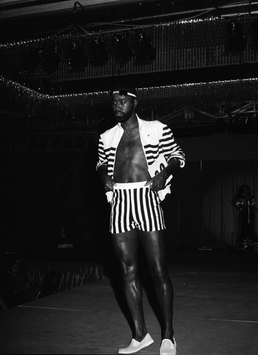 Black Gold Trade Show Pageant participant modeling, Los Angeles, 1983