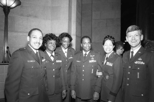 Brigadier General Sherian Cadoria posing with members of the military during a reception at City Hall, Los Angeles, 1987