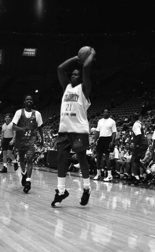 Chris Rock playing in Magic Johnson's celebrity event at the Great Western Forum, Inglewood, 1994