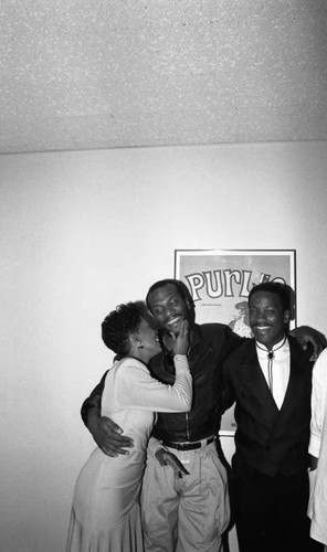 Anita Baker hugging George Howard at the 11th Annual BRE Conference, Los Angeles, 1987